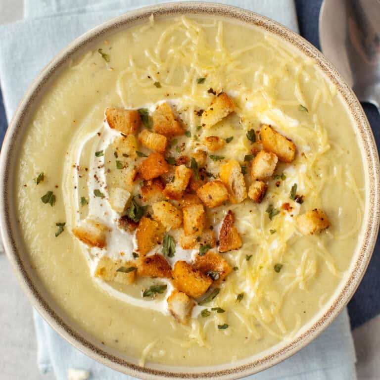 Creamy cauliflower cheese soup with croutons.