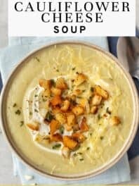 Creamy cauliflower soup with a title overlay.