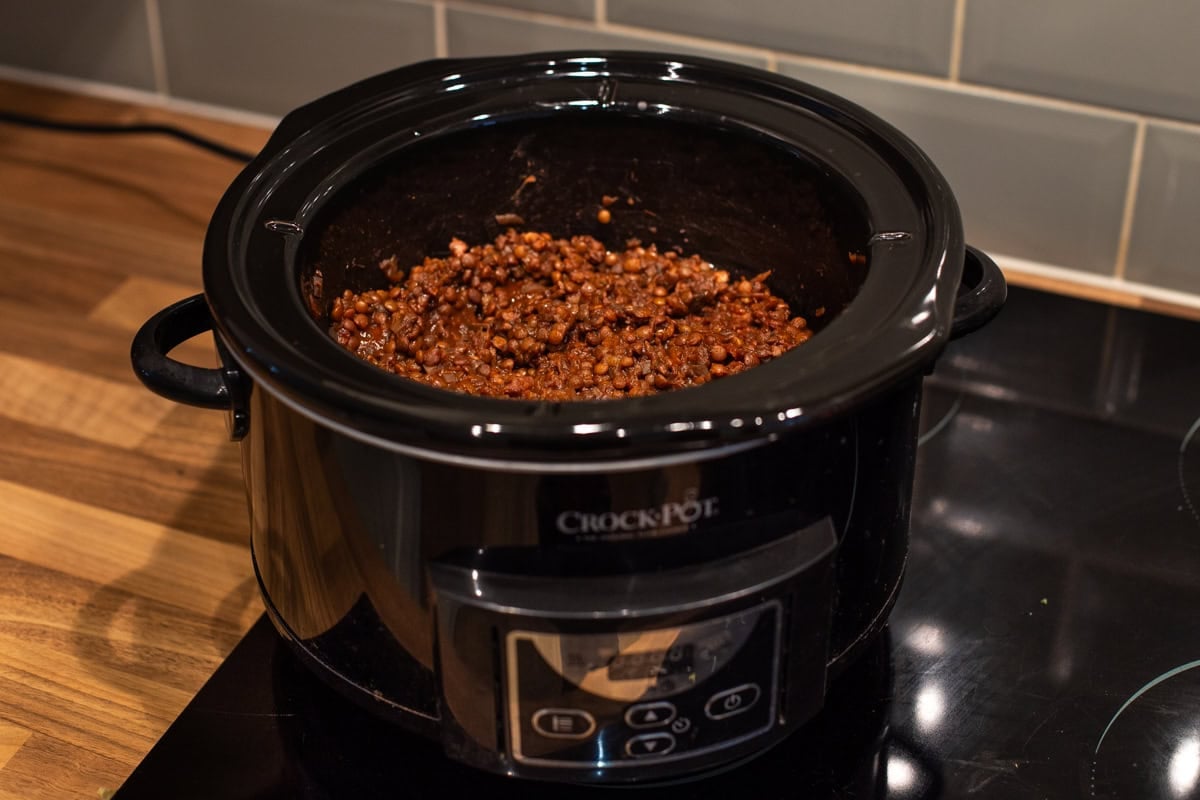A slow cooker filled with lentil bolognese.