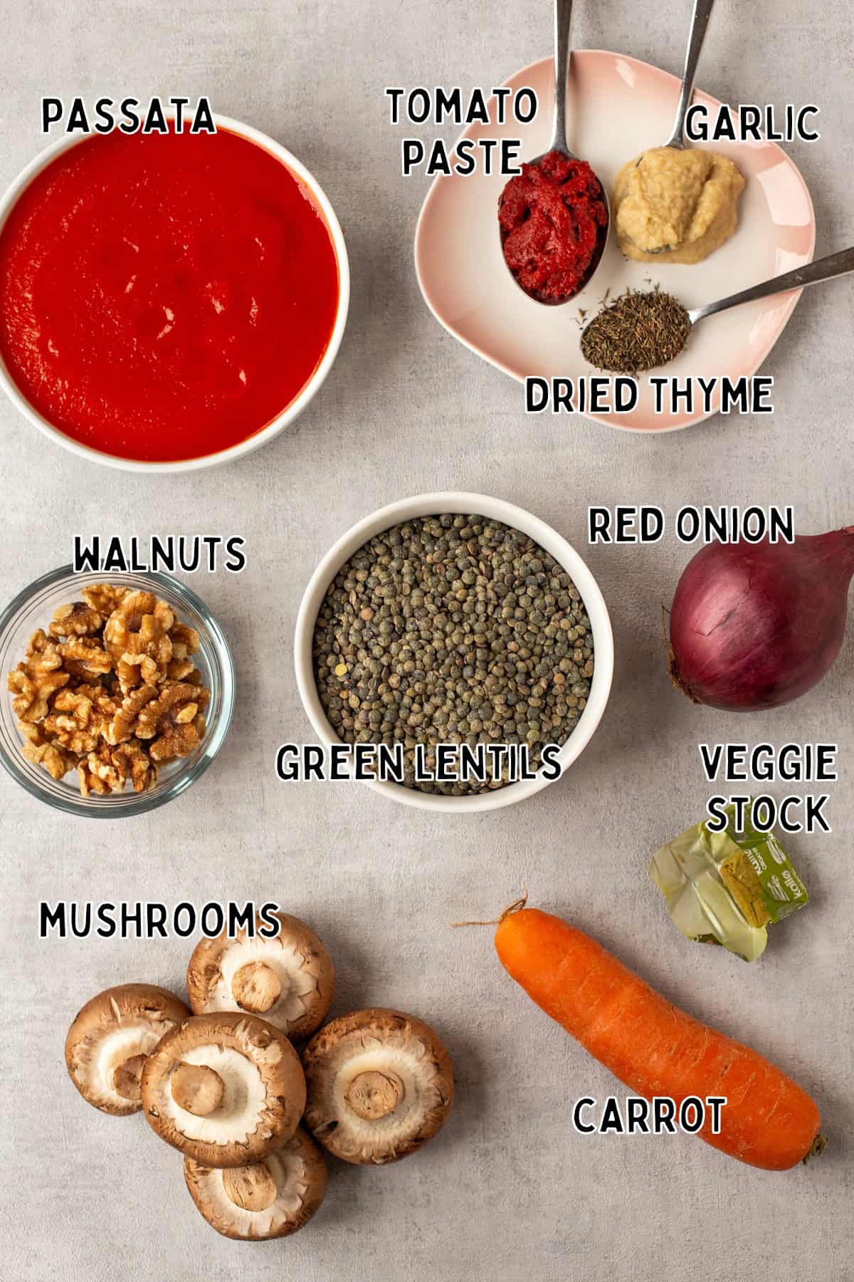 Ingredients for slow cooker lentil bolognese laid out with text overlay.