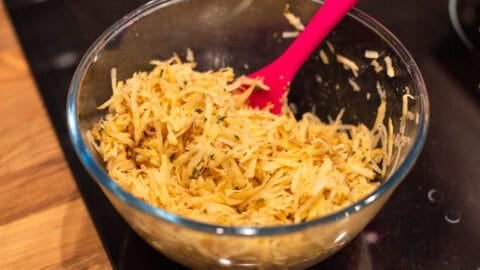 Grated potato in a bowl.