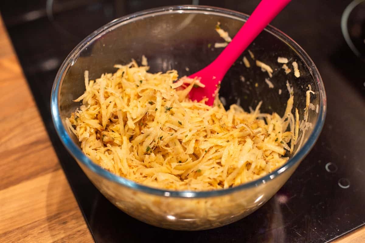 Grated potato in a bowl.