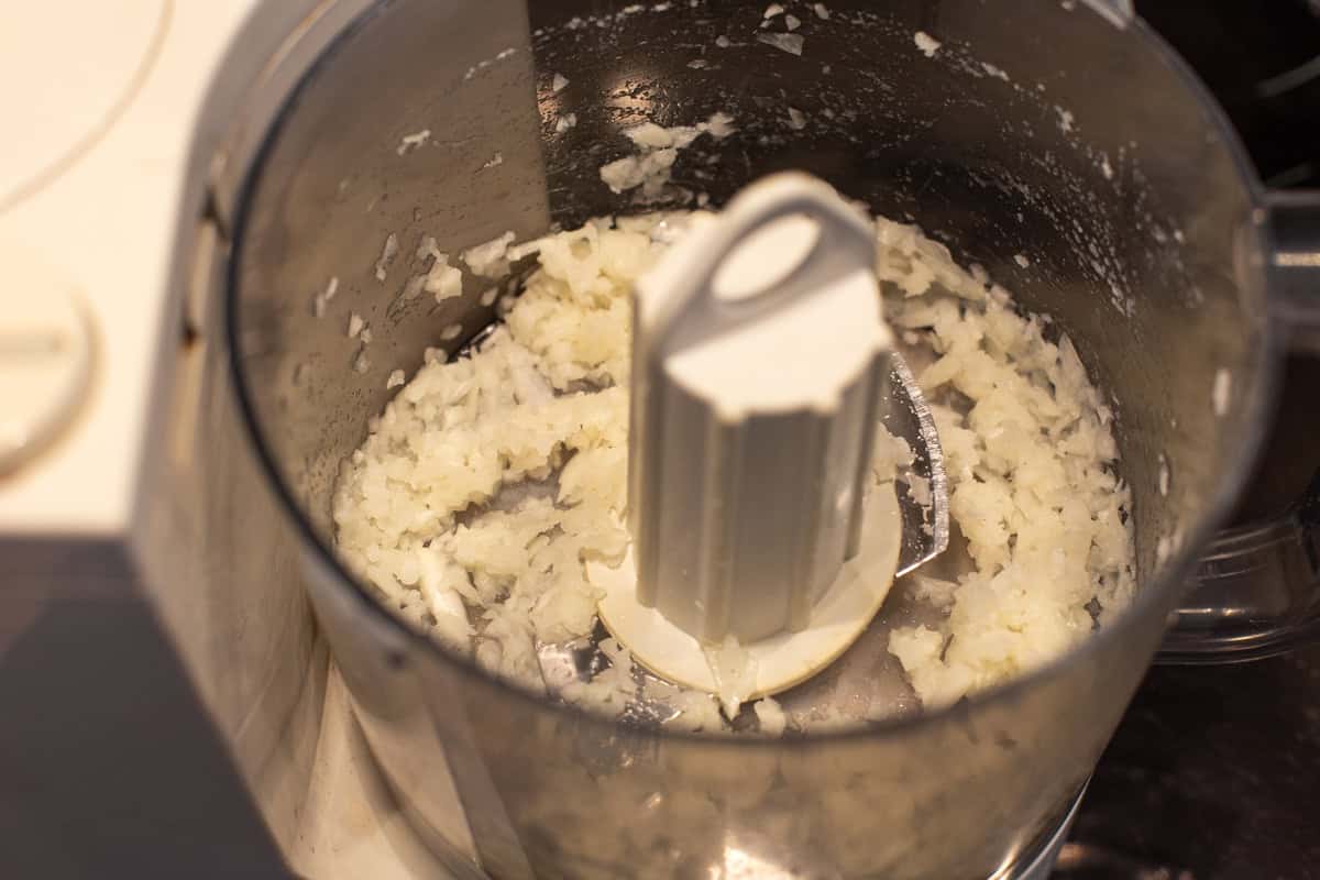 Finely chopped onion in a food processor.