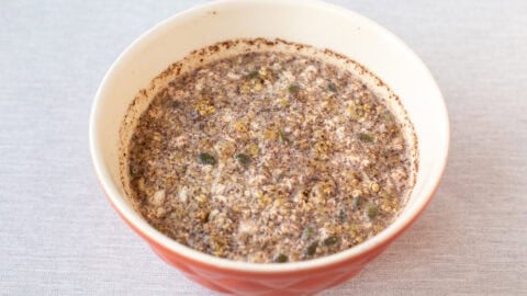 High protein overnight oats in a large bowl after the ingredients have settled overnight.