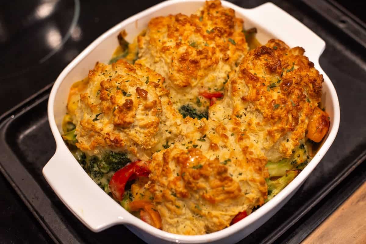 Vegetable cobbler topped with crispy cheese scones.