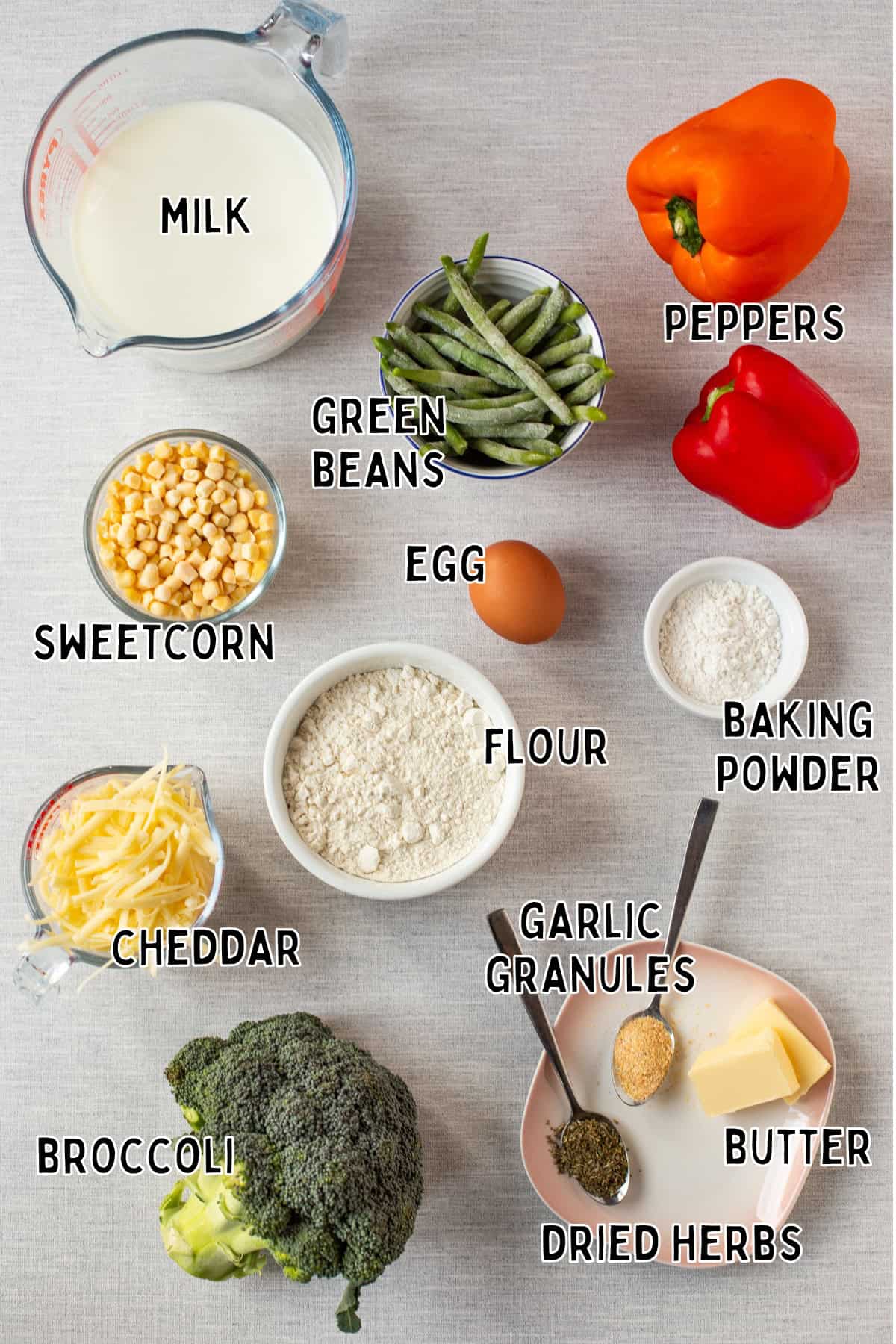 Ingredients for vegetable cobbler laid out with text overlay.