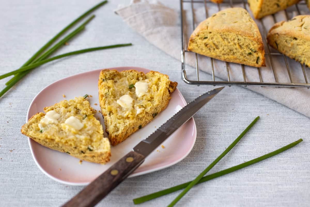 An easy hummus scone cut in half and spread with butter.