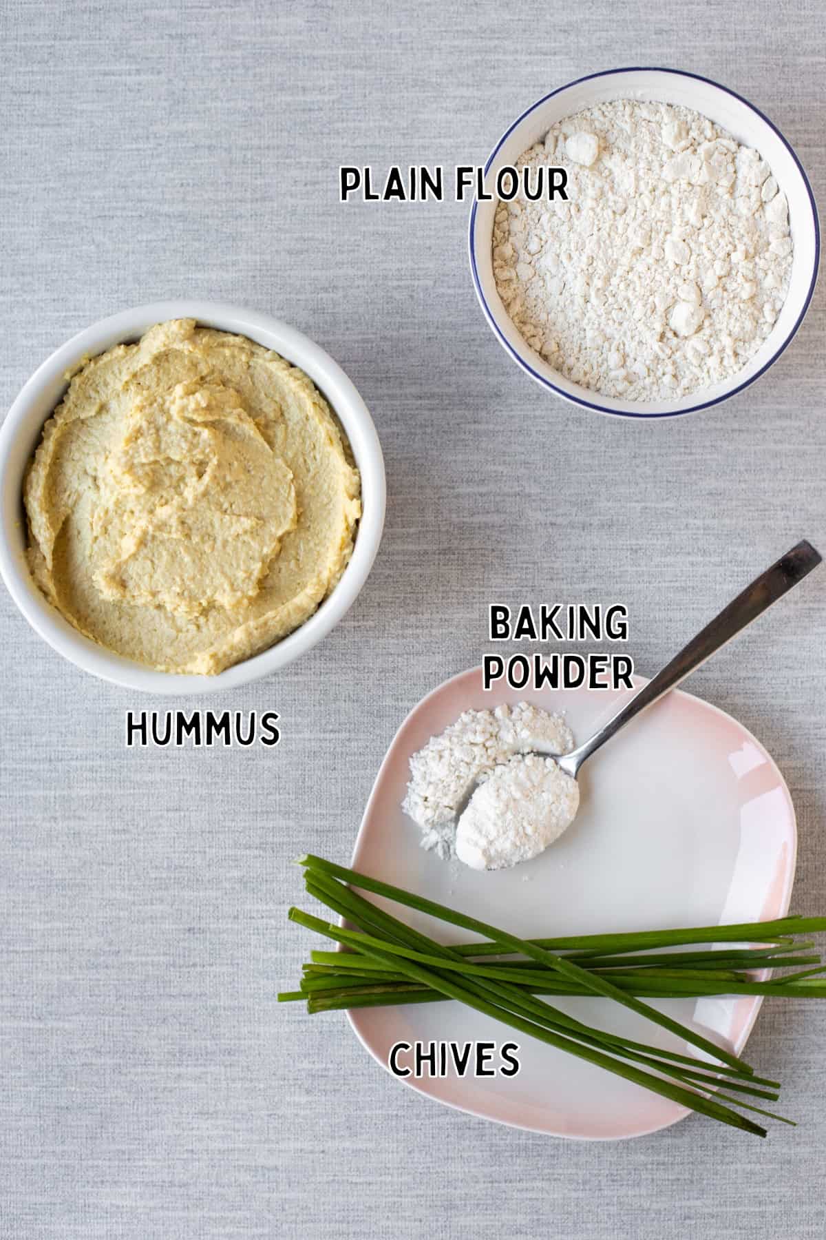 Ingredients for easy hummus scones laid out with text overlay.