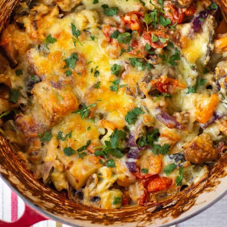 Overhead shot of cheesy vegetable potato bake.