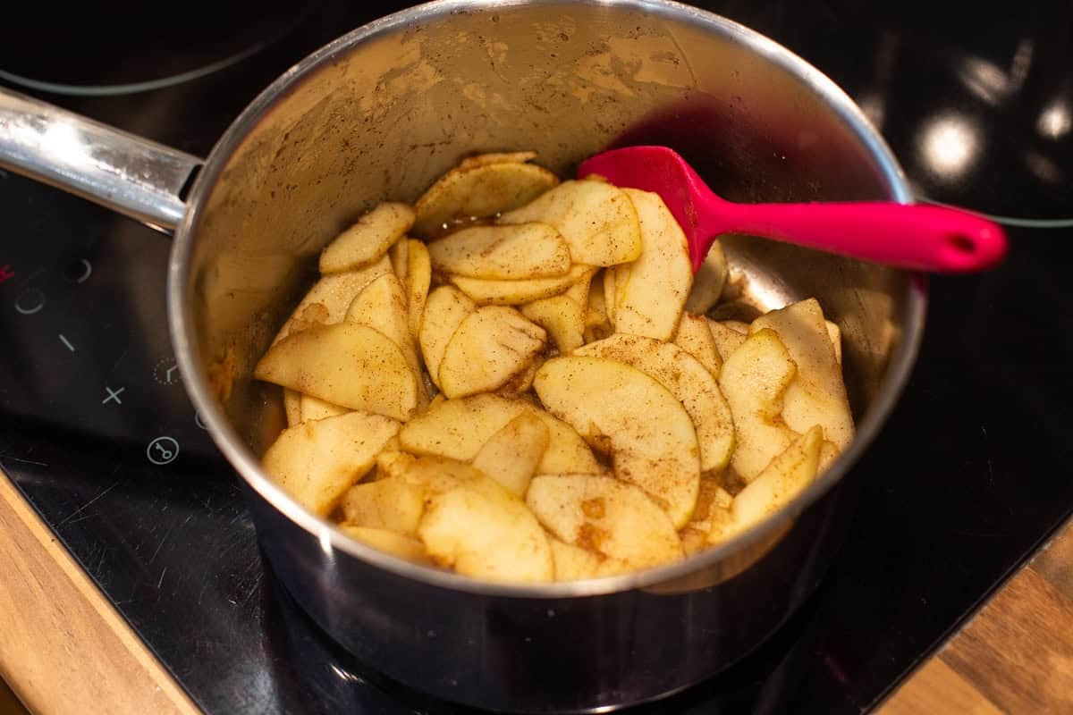 Spiced stewed apples in a saucepan.