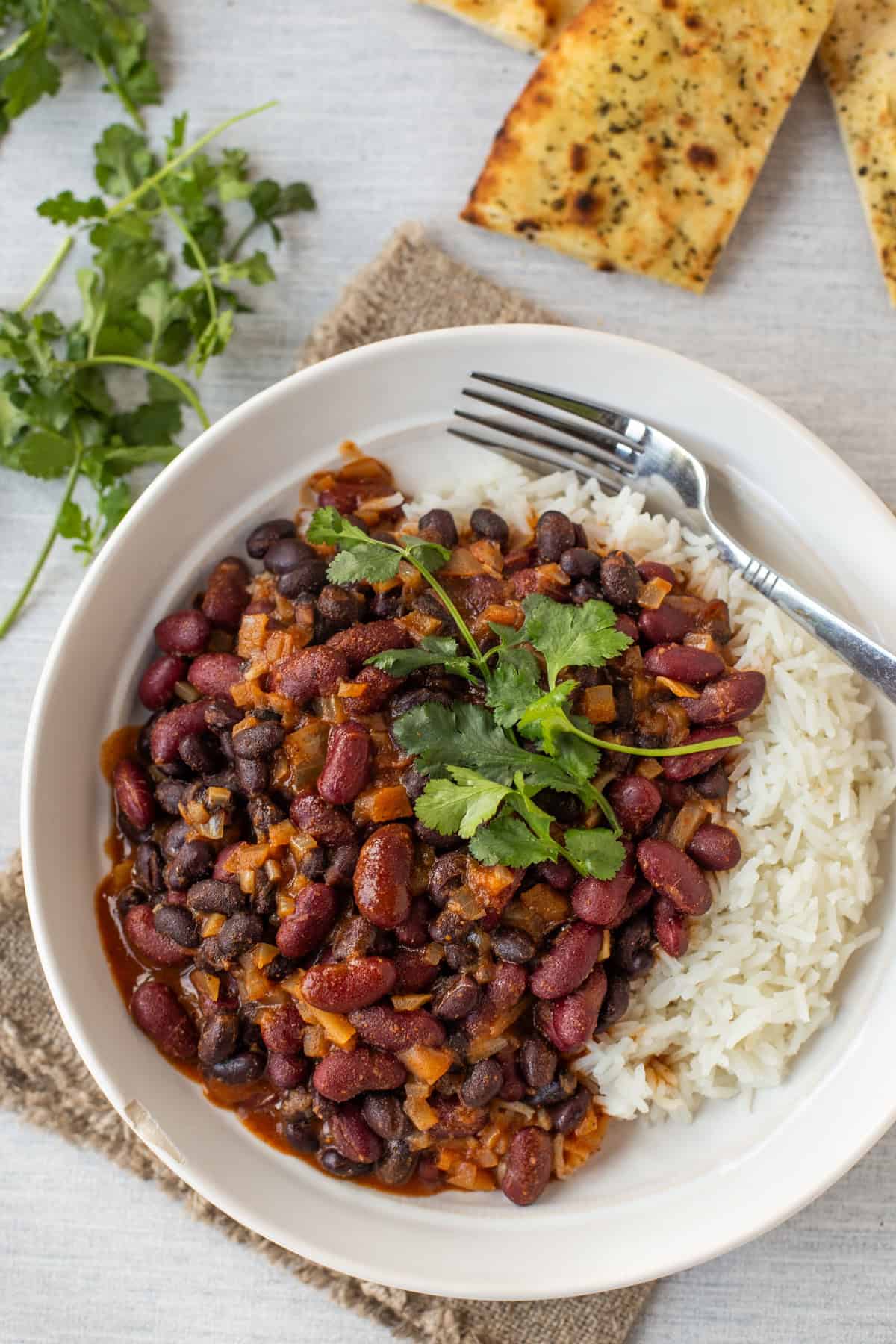 Overhead shot of easy kidney bean curry in a bowl with rice.