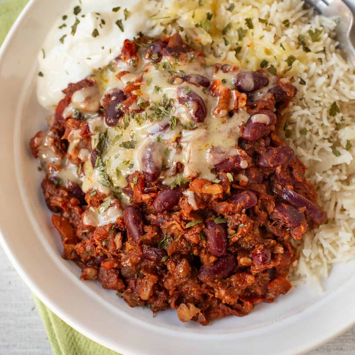 Easy kidney bean chilli and rice in a bowl.