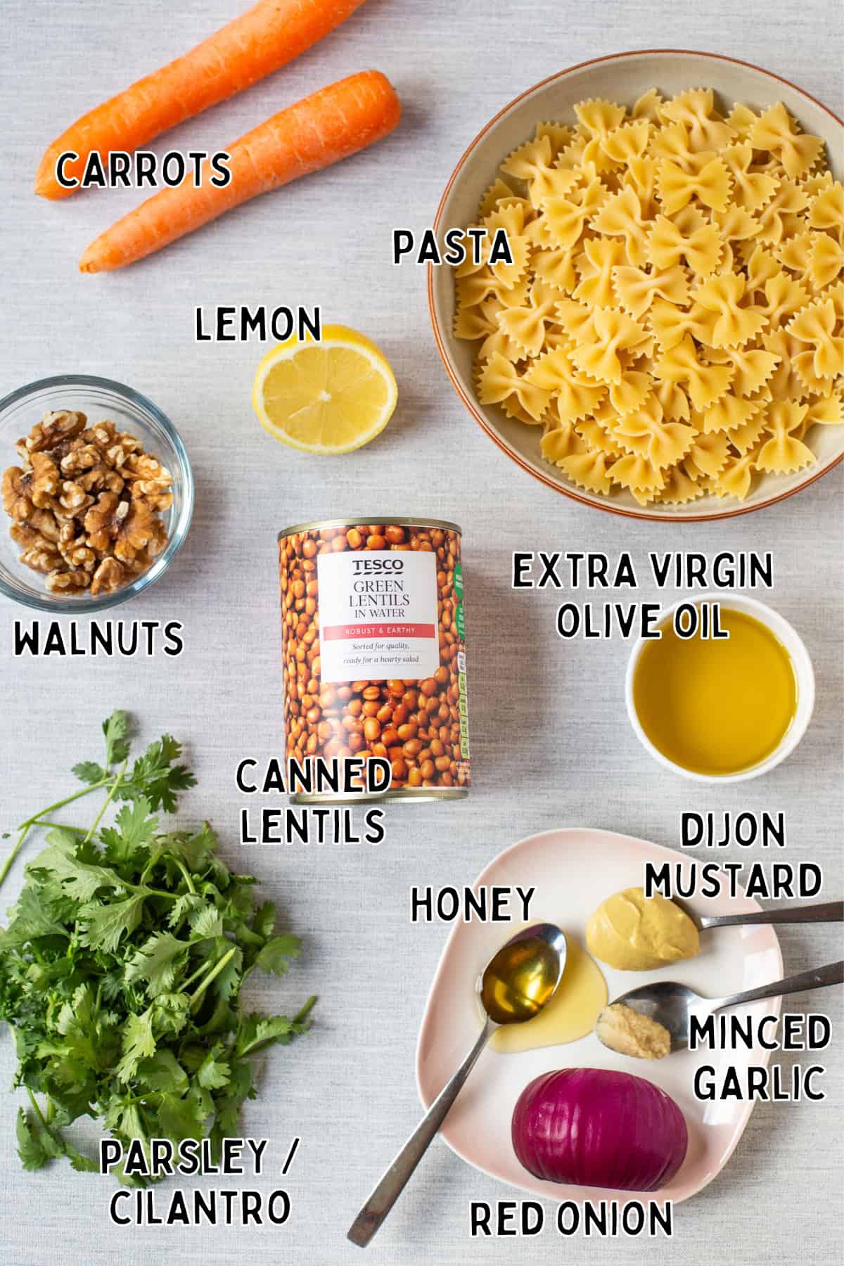 Ingredients for French lentil pasta salad laid out with text overlay.