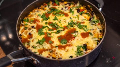 A pan of cheesy enchilada orzo.