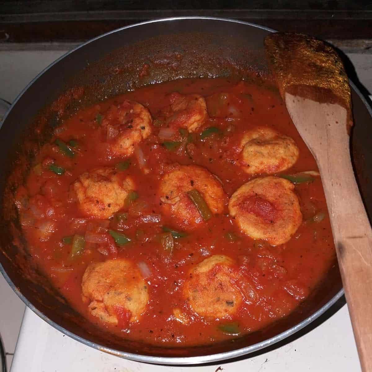 Tofu meatballs in tomato sauce.