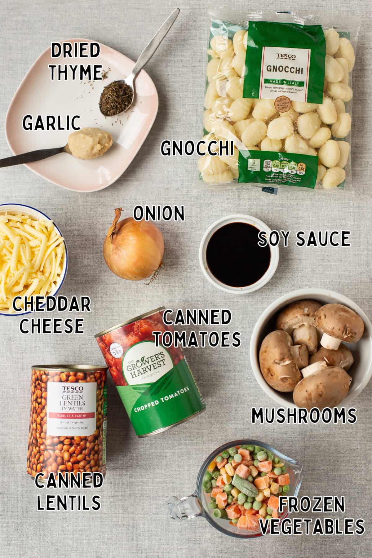 Ingredients for vegetarian shepherd's pie gnocchi laid out with text overlay.