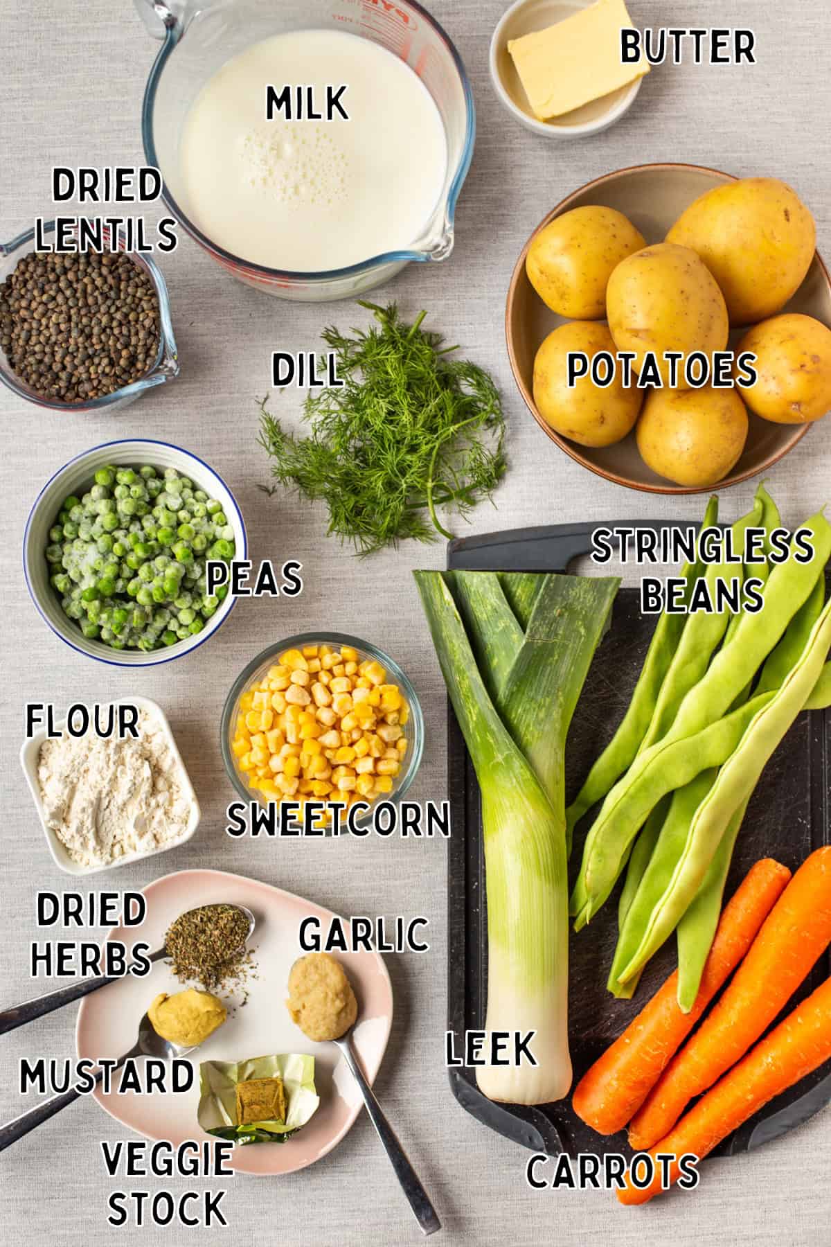 Ingredients for creamy vegetable stew with lentils laid out with text overlay.