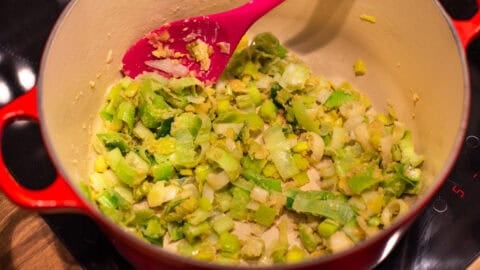 Sautéed leeks and flour in a large pot.