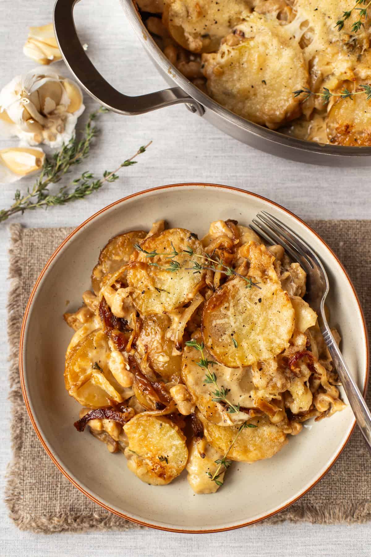 A portion of French onion potato bake in a bowl.
