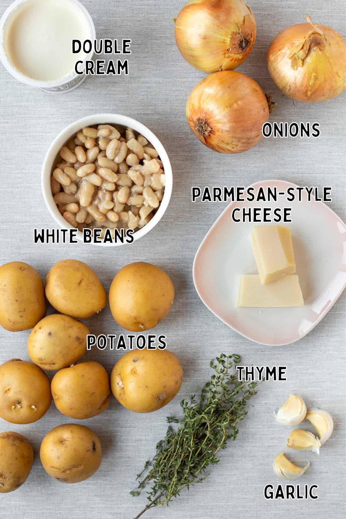 Ingredients for French onion potato bake laid out with text overlay.